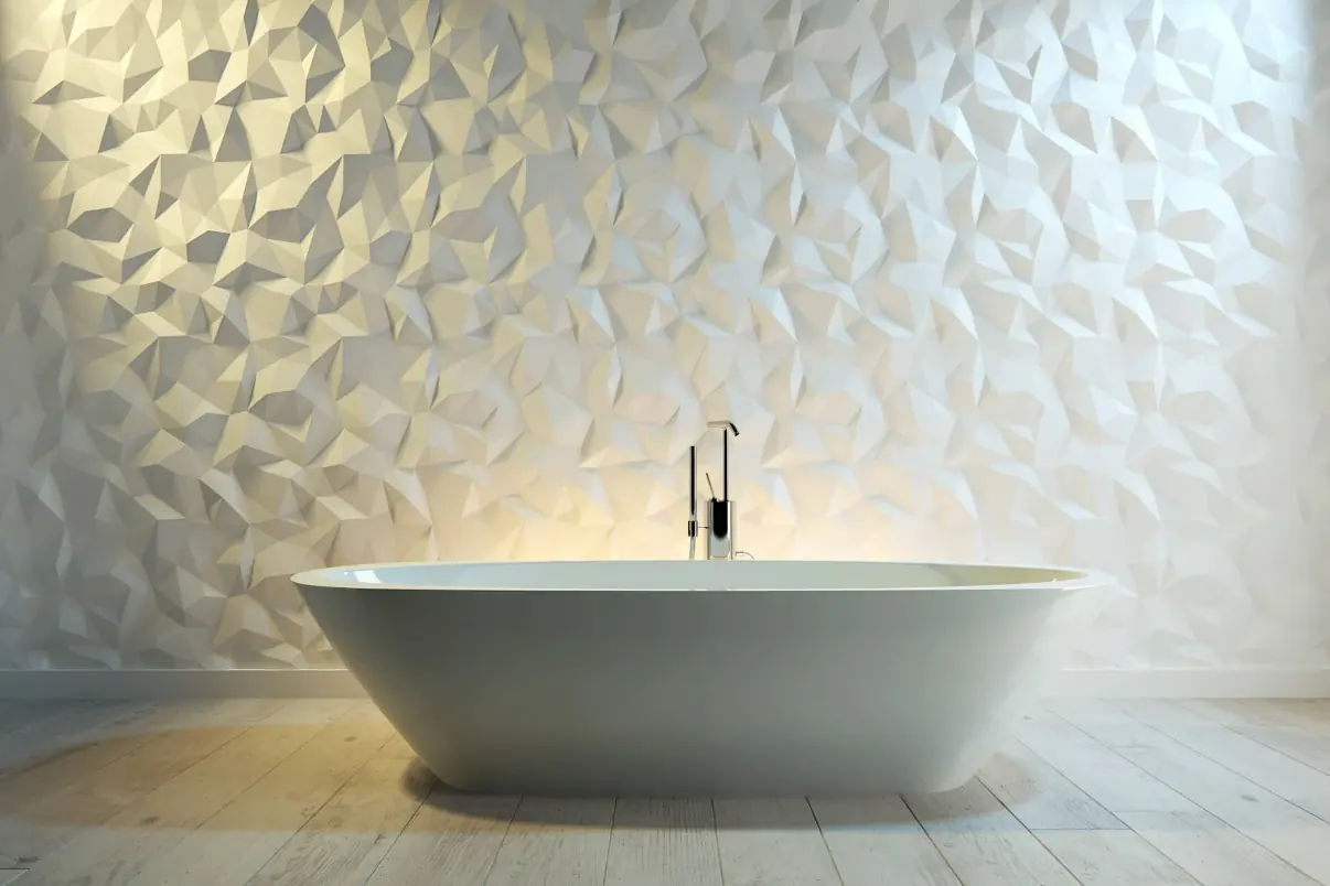 Badkamer met een vrijstaand bad tegen een witte 3D-wand met scherp facetreliëf