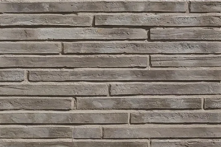 Detail van Valrigo langformaten: lange, slanke grijze betonstrips